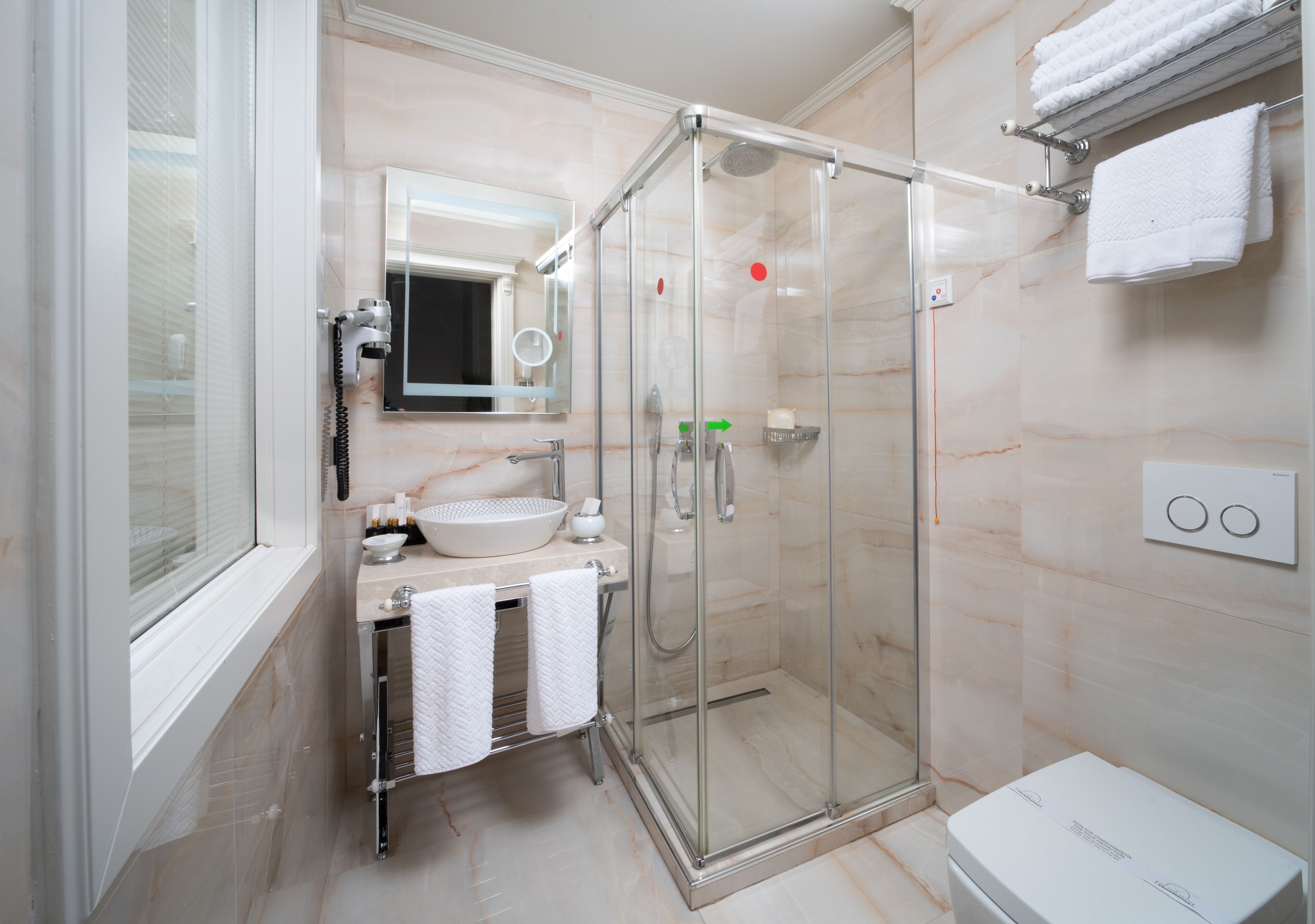 shower, rainfall showerhead, designer toiletries, hair dryer