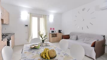 Apartment, Ground Floor | Living area | Flat-screen TV
