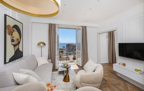 Deluxe Suite, Balcony, Sea View | Living area | Flat-screen TV