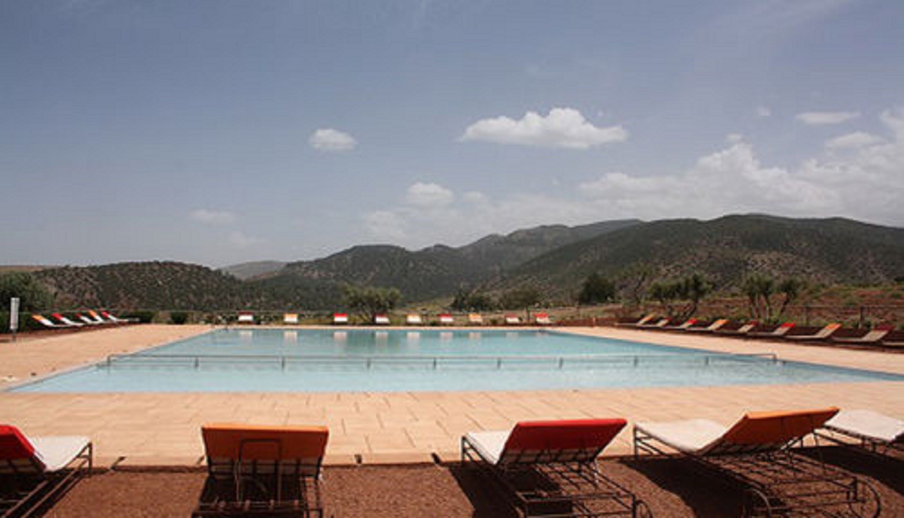 2 outdoor pools, pool umbrellas, pool loungers