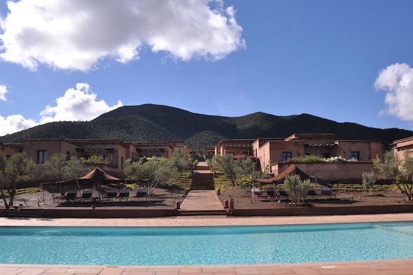 2 outdoor pools, pool umbrellas, pool loungers