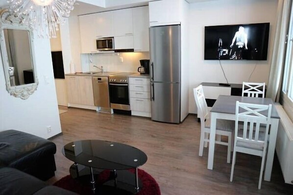 Appartement Deluxe, 1 chambre, cuisine, vue ville | Coin séjour