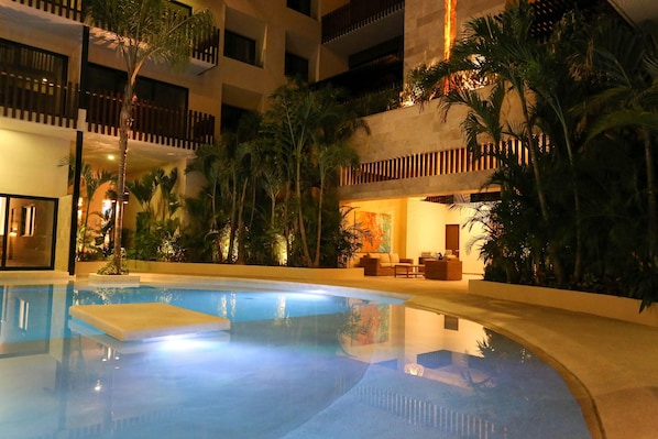 Apartment, 1 King Bed, Garden View (Palmares A04- 1Bedroom exquisite) | Pool | Outdoor pool, open 9:00 AM to 9:00 PM, sun loungers