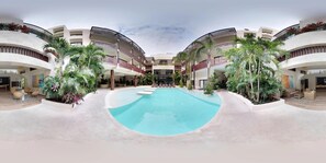 Lägenhet - 1 kingsize-säng - utsikt mot trädgården (Palmares A04- 1Bedroom exquisite) | Pool | Utomhuspool med öppettider 09.00 till 21.00, och solstolar