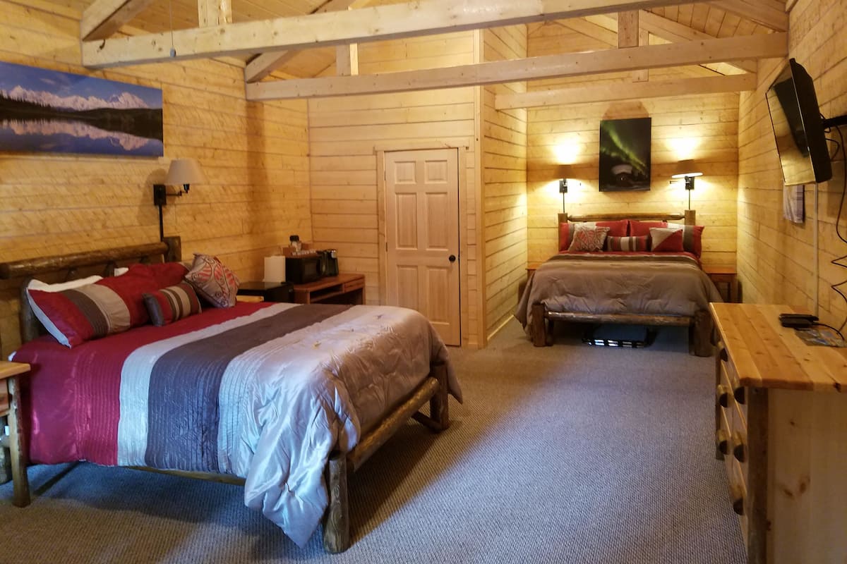Luxe beddengoed, verduisterende gordijnen, gratis babybedden