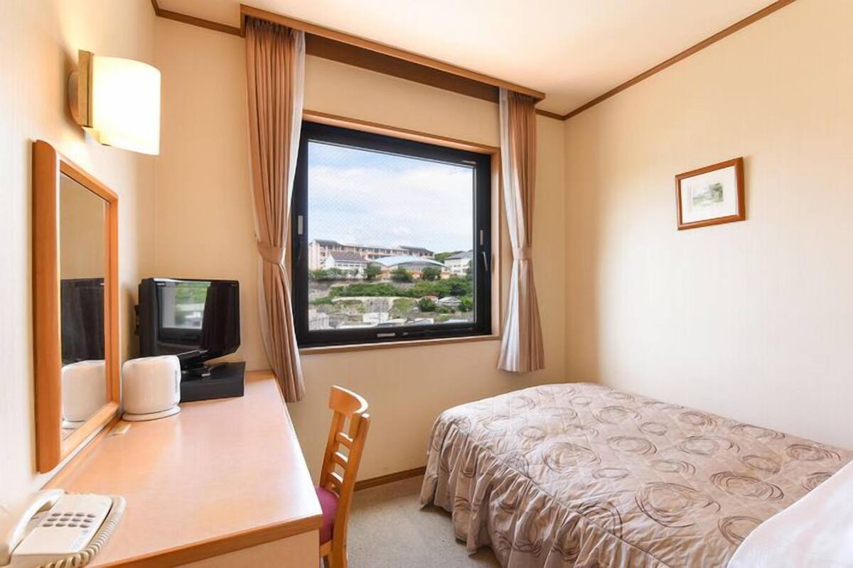 Desk, WiFi (free), bed sheets