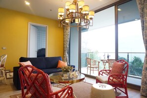 2 Bedroom Apartment with Sea View | Living area | TV - Baan Plai Haad Beachfront Condominium (Pattaya)