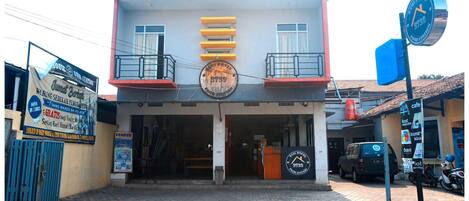 A building with a sign indicating it is a food station.