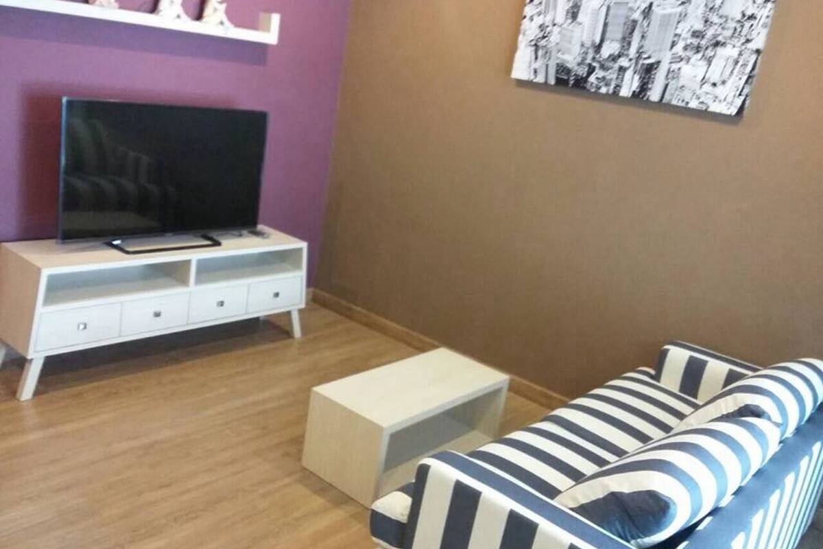 suite balcony city view | living area | flat-screen tv