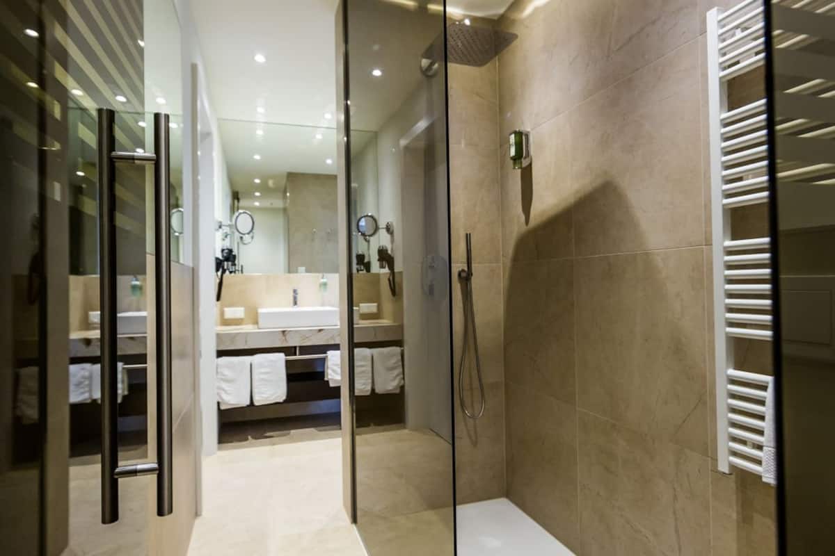 family suite, 2 bedrooms, garden view | bathroom | free toiletries, hair dryer, towels