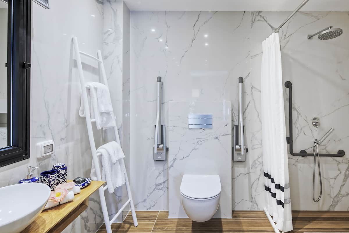junior suite | bathroom | shower, rainfall showerhead, free toiletries, hair dryer