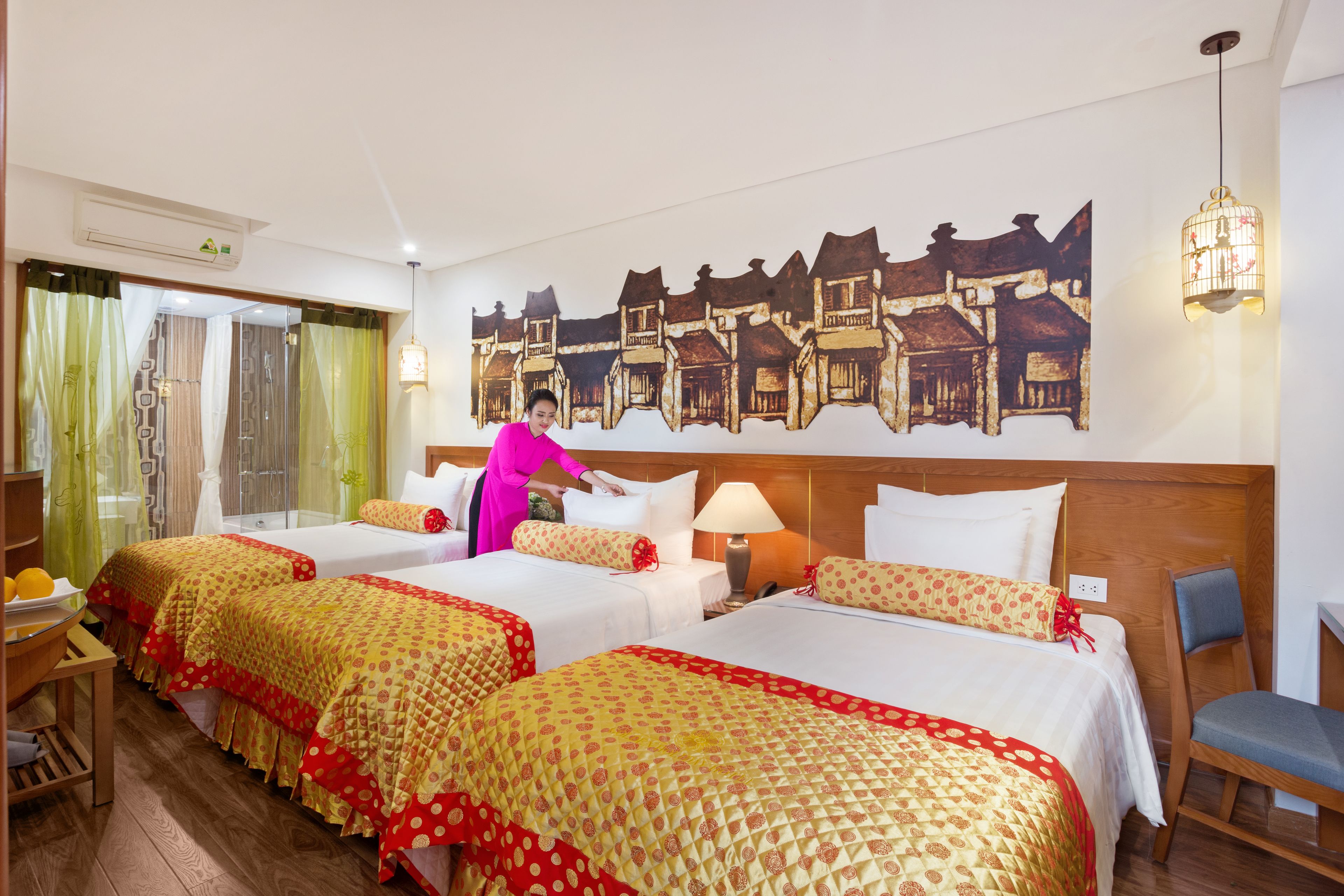 deluxe triple room | living room | 42-inch plasma tv with digital channels, tv, dvd player