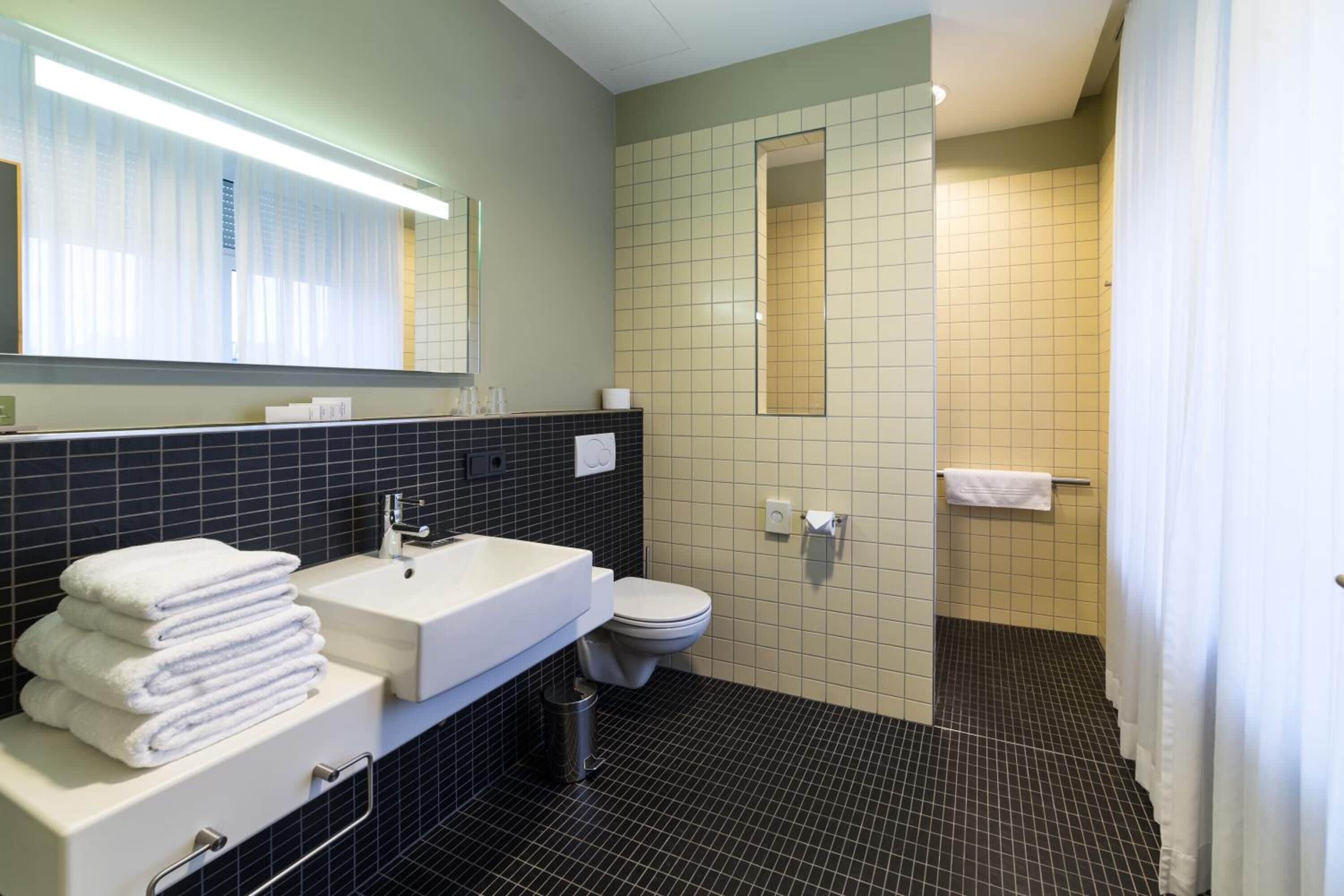 free toiletries, hair dryer, slippers, towels