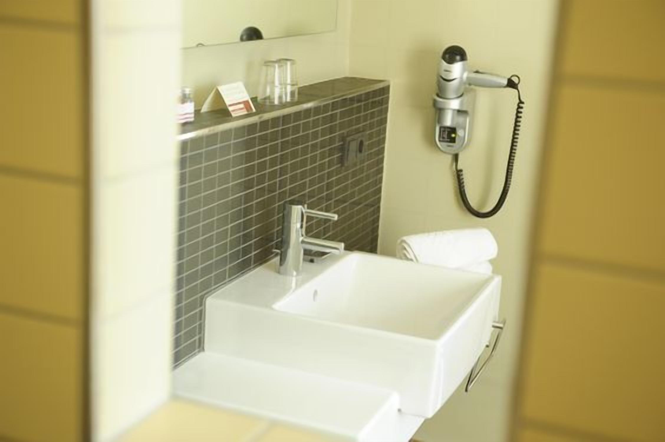 single room | bathroom | free toiletries, hair dryer, slippers, towels