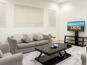 Rideaux occultants, chambres insonorisées, fer et planche à repasser