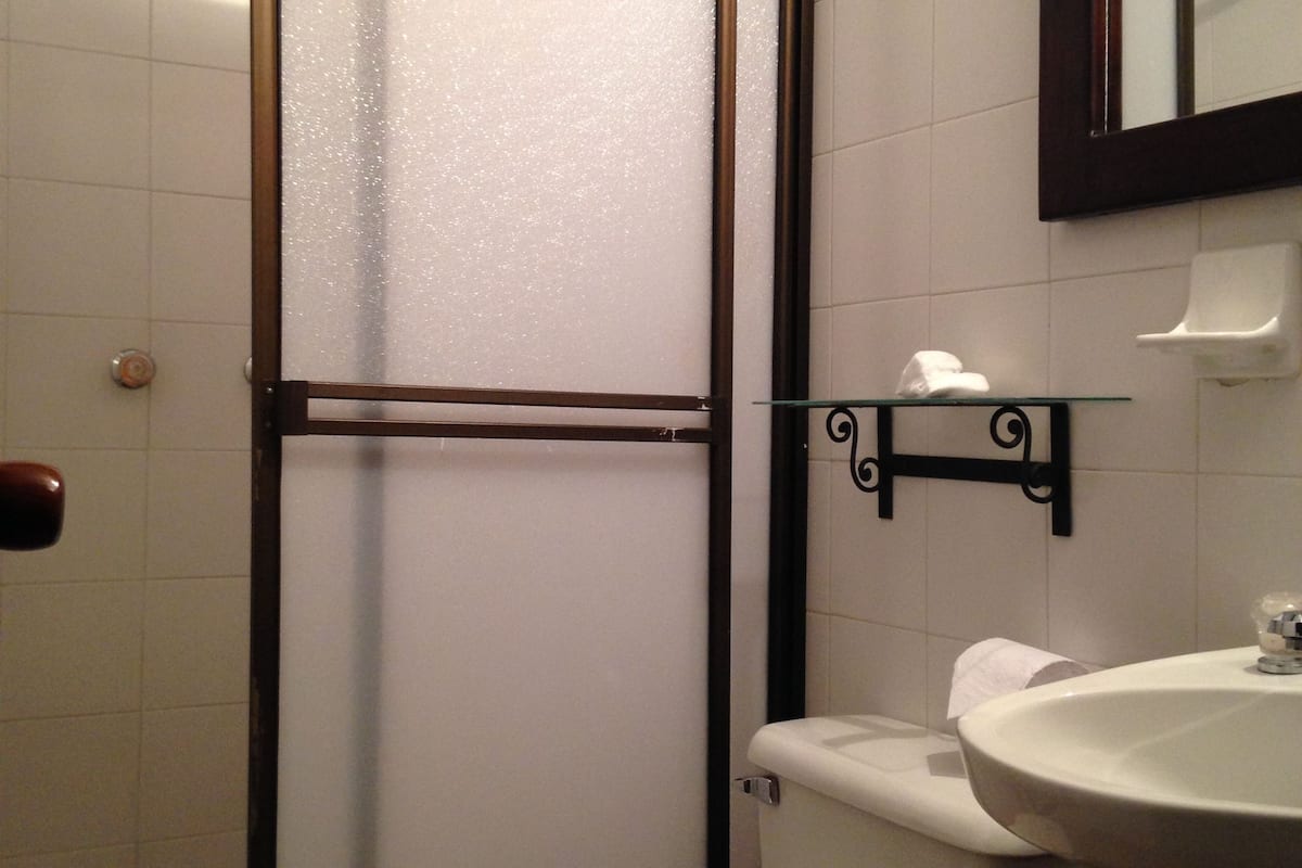 quadruple room | bathroom | shower, free toiletries, hair dryer, towels
