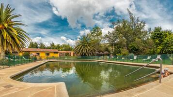 2 outdoor pools, open 7:00 AM to 9:00 PM, pool loungers