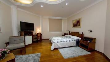 Quarto casal superluxo | Frigobar, escrivaninha, cortinas blackout, berços grátis