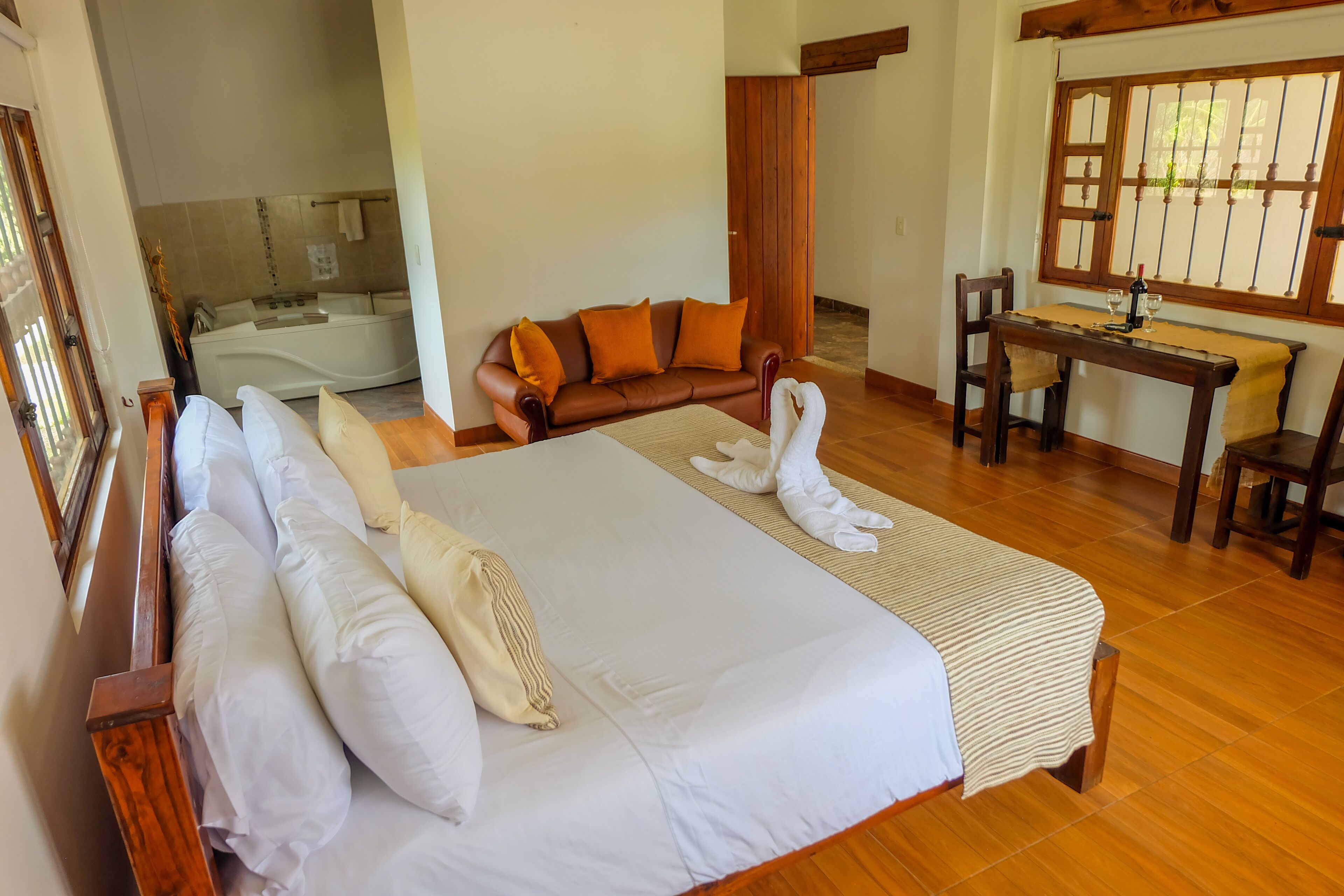 suite, 1 king bed | premium bedding, down duvets, blackout curtains, iron/ironing board