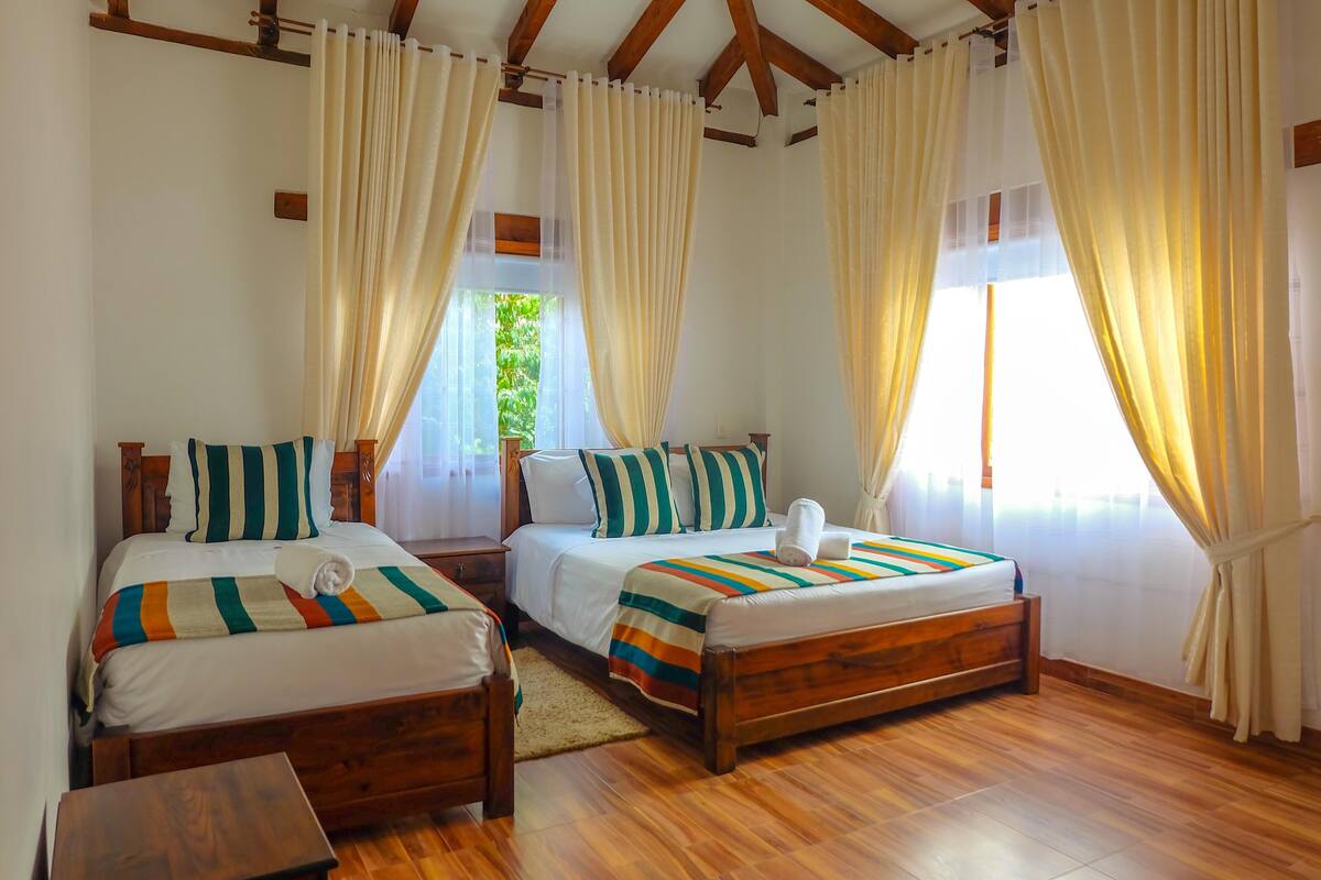 Premium bedding, down comforters, blackout drapes