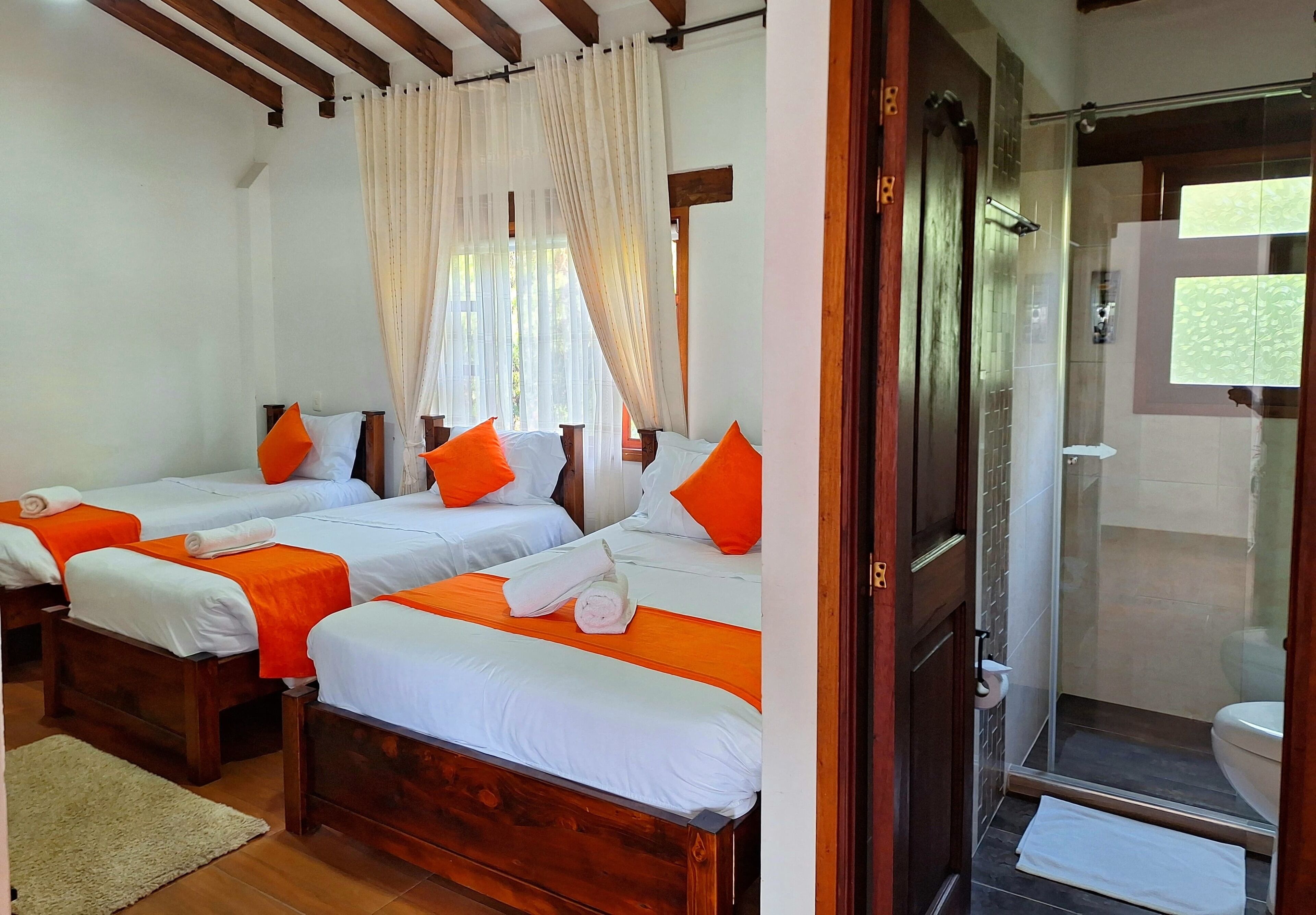 quadruple room | bathroom | free toiletries, slippers, towels