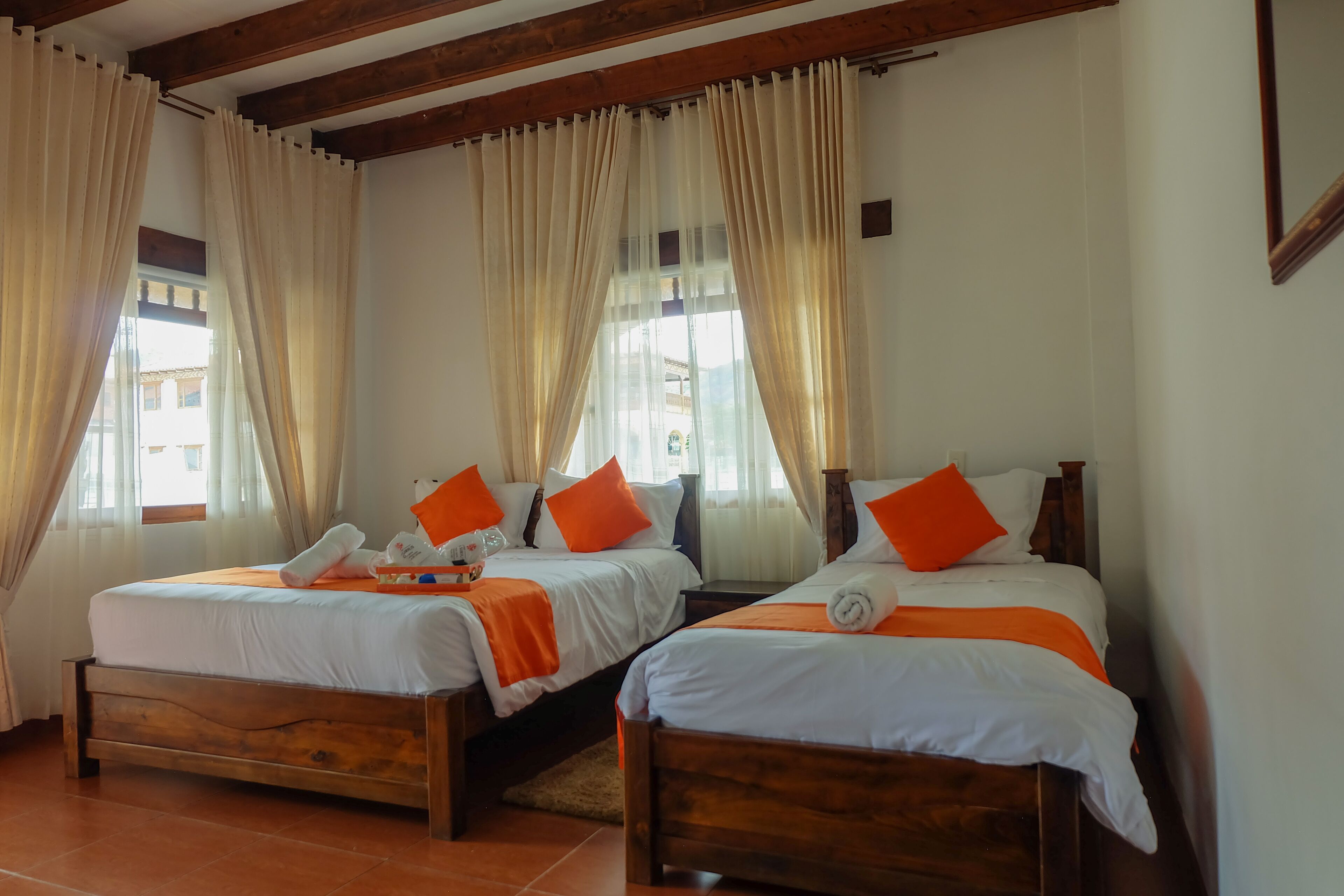 triple room | premium bedding, down duvets, blackout curtains, iron/ironing board