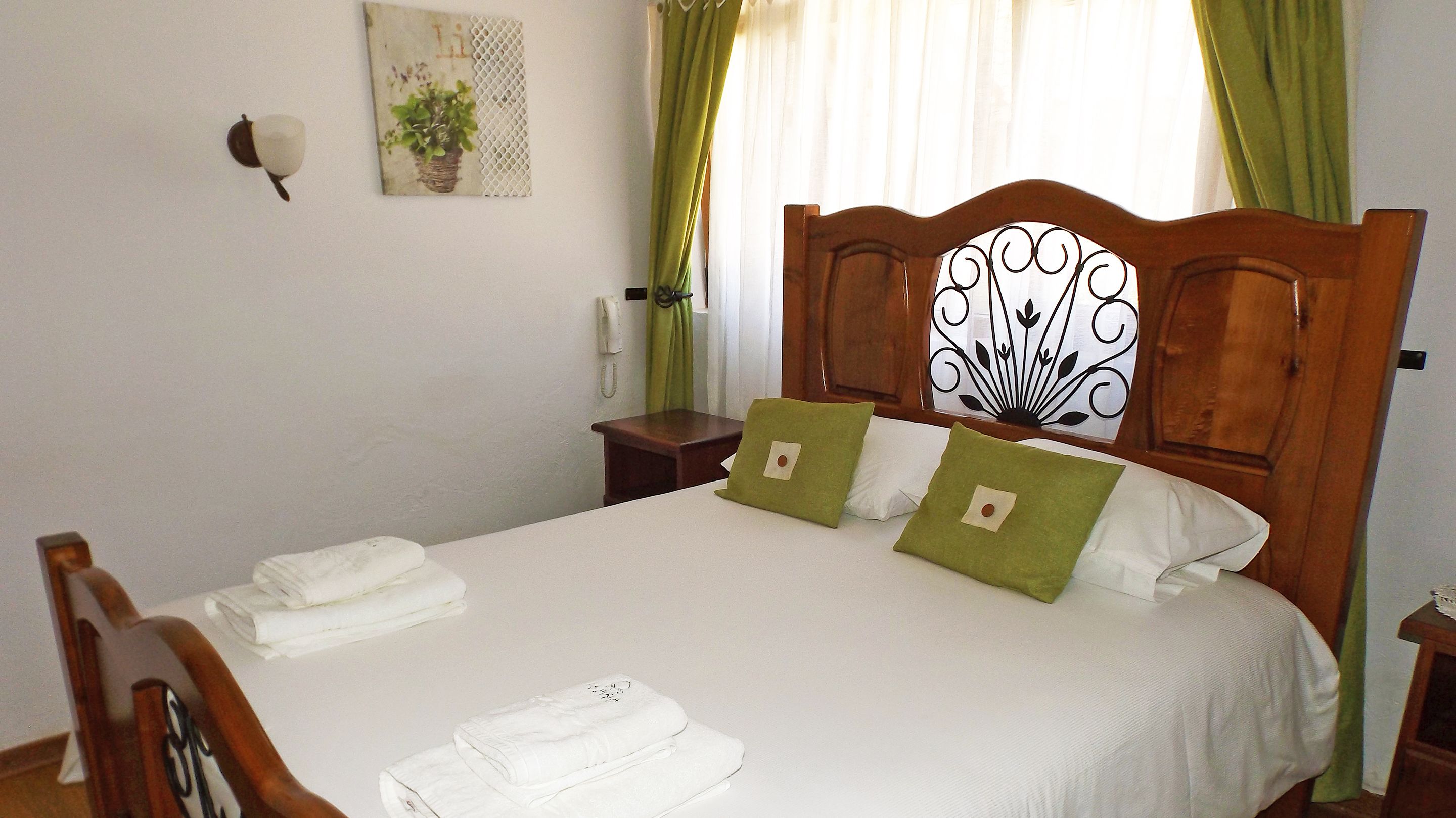 economy room, 1 queen bed, hot tub, ground floor | 1 bedroom, premium bedding, minibar, in-room safe