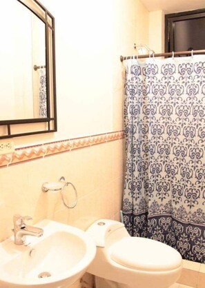 Shower, free toiletries, hair dryer, towels