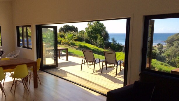 House, 2 Bedrooms, Kitchen, Ocean View | Living area | Flat-screen TV - Ocean Cliff Court (Kuaotunu)