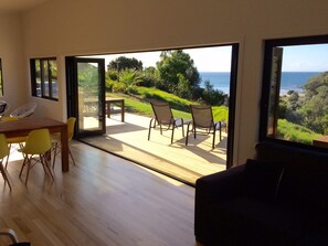 House, 2 Bedrooms, Kitchen, Ocean View | Living area | Flat-screen TV - Ocean Cliff Court (Kuaotunu)