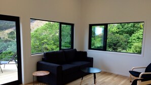 House, 2 Bedrooms, Kitchen, Ocean View | Living area | Flat-screen TV - Ocean Cliff Court (Kuaotunu)