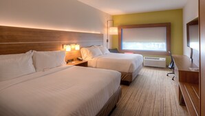 A hotel room with two beds, a desk, a lamp, and a large window. - Holiday Inn Express & Suites Fort Mill by IHG (Fort Mill)