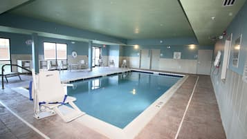 Indoor pool, open 7 AM to 11 PM, pool loungers