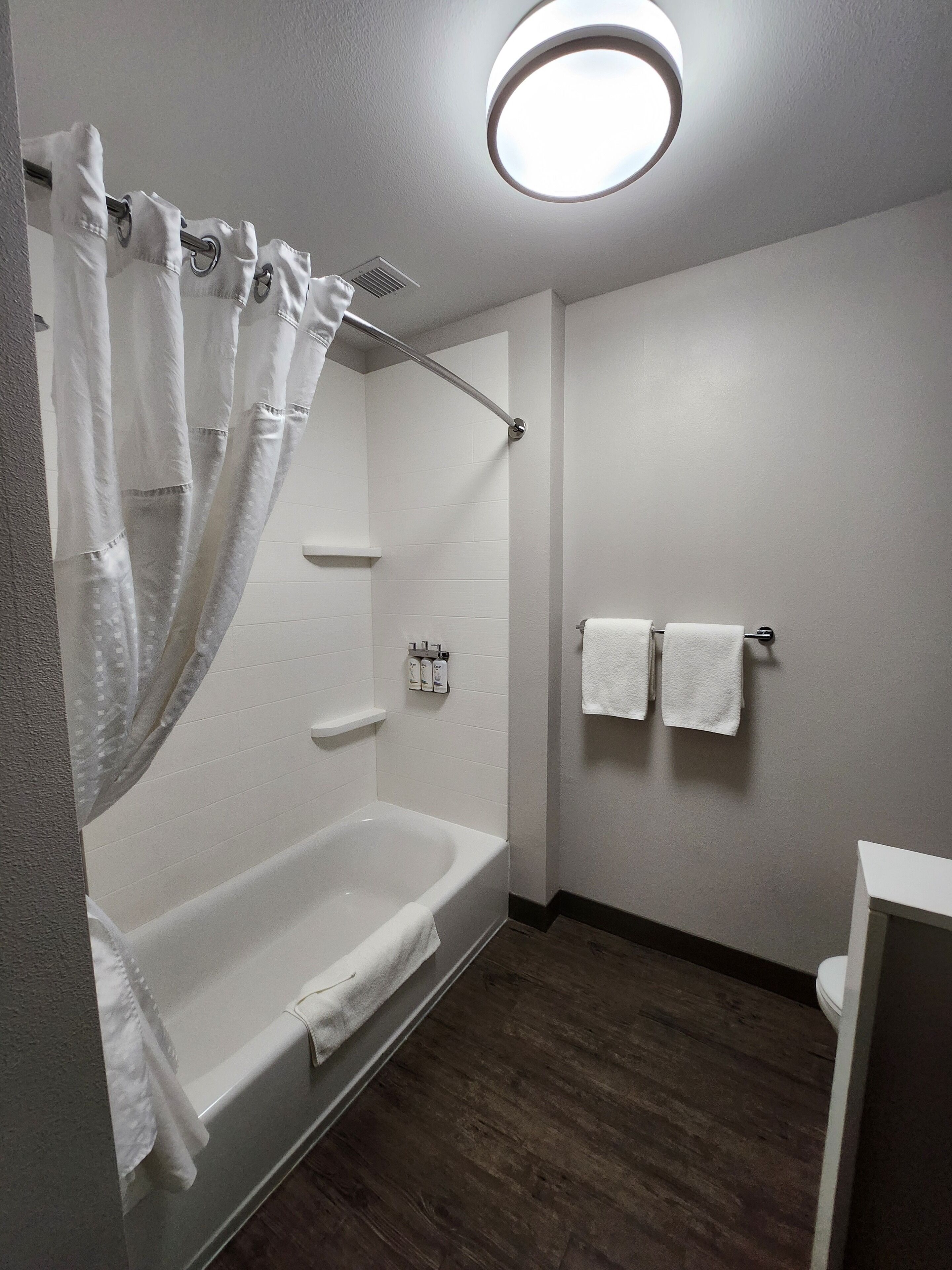 suite, 2 queen beds | bathroom | free toiletries, hair dryer, towels