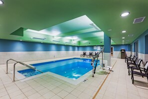 Indoor pool, open 9:00 AM to 10:00 PM, pool loungers