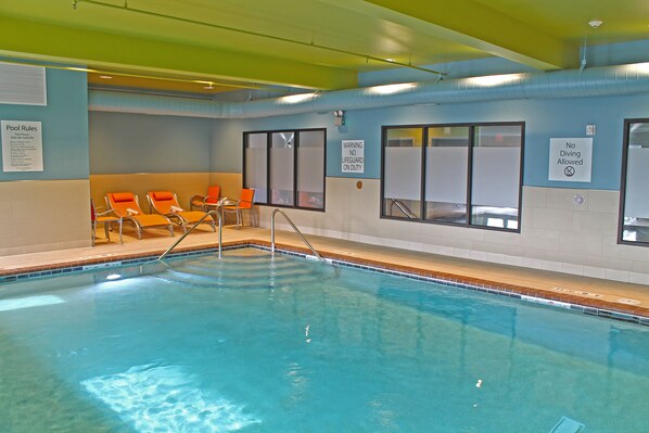 Indoor pool, open 8 AM to 10 PM, pool loungers