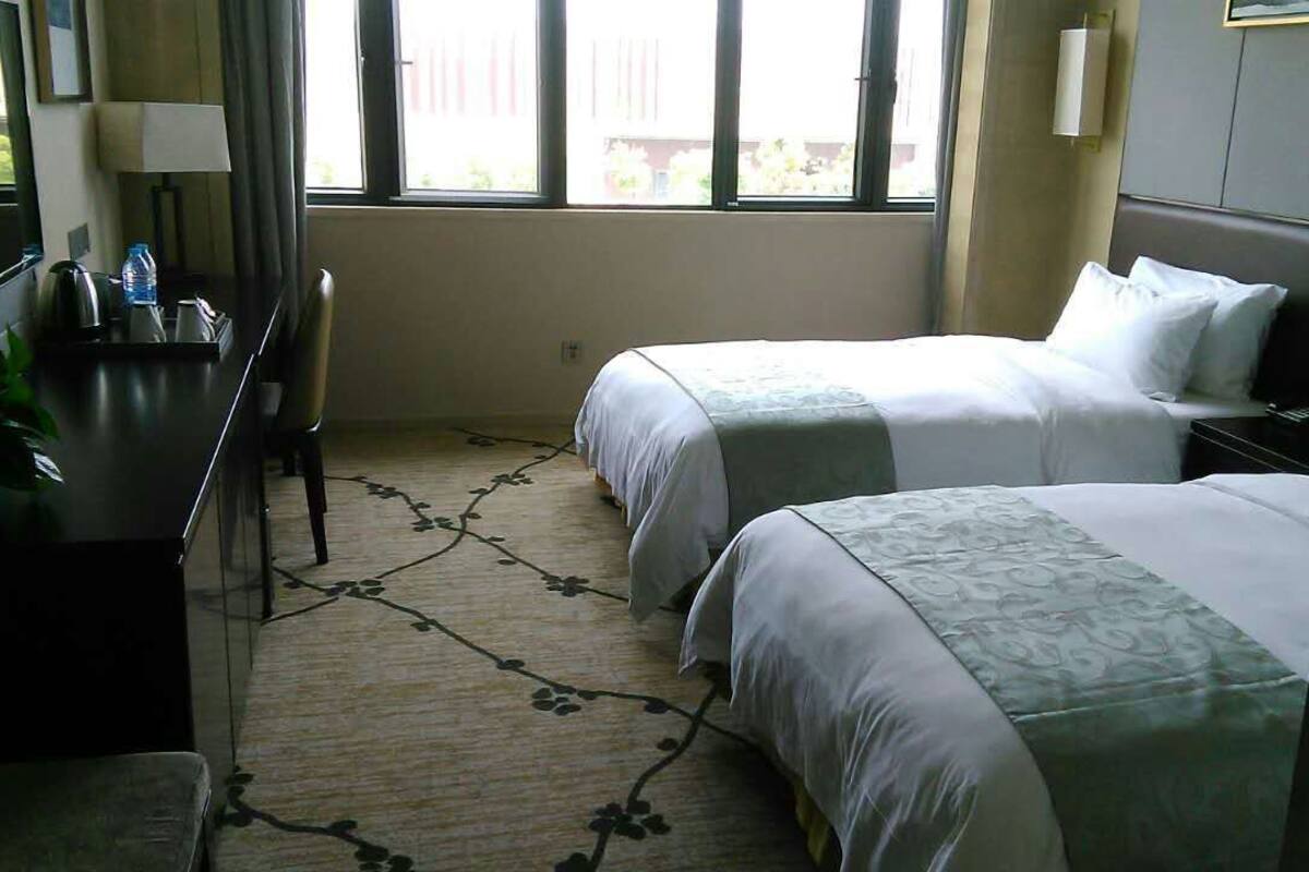 Quarto duplo luxo | Frigobar, cofres nos quartos, escrivaninha, cortinas blackout