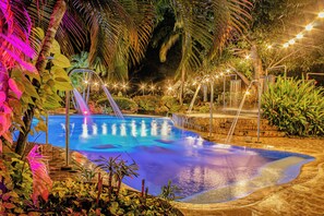 Outdoor pool, open 8:00 AM to 9:00 PM, free pool cabanas