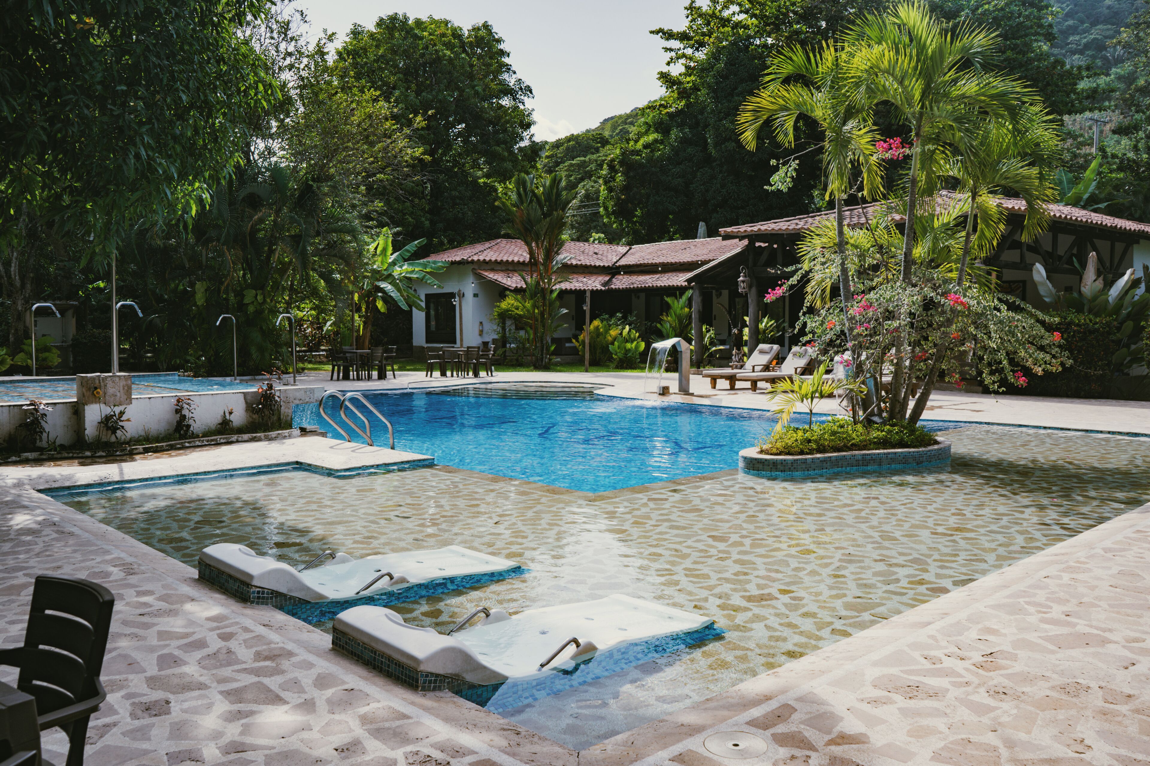 Outdoor pool, open 8:00 AM to 9:00 PM, free pool cabanas