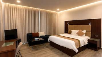 Egyptian cotton sheets, premium bedding, minibar, in-room safe