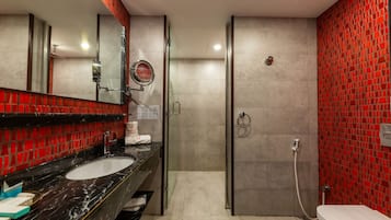 Designer toiletries, hair dryer, bathrobes, slippers
