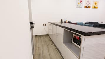 Apartment, 2 Bedrooms | Private kitchen | Electric kettle, eco-friendly cleaning products