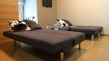Superior A, Non Smoking | Living area | Flat-screen TV