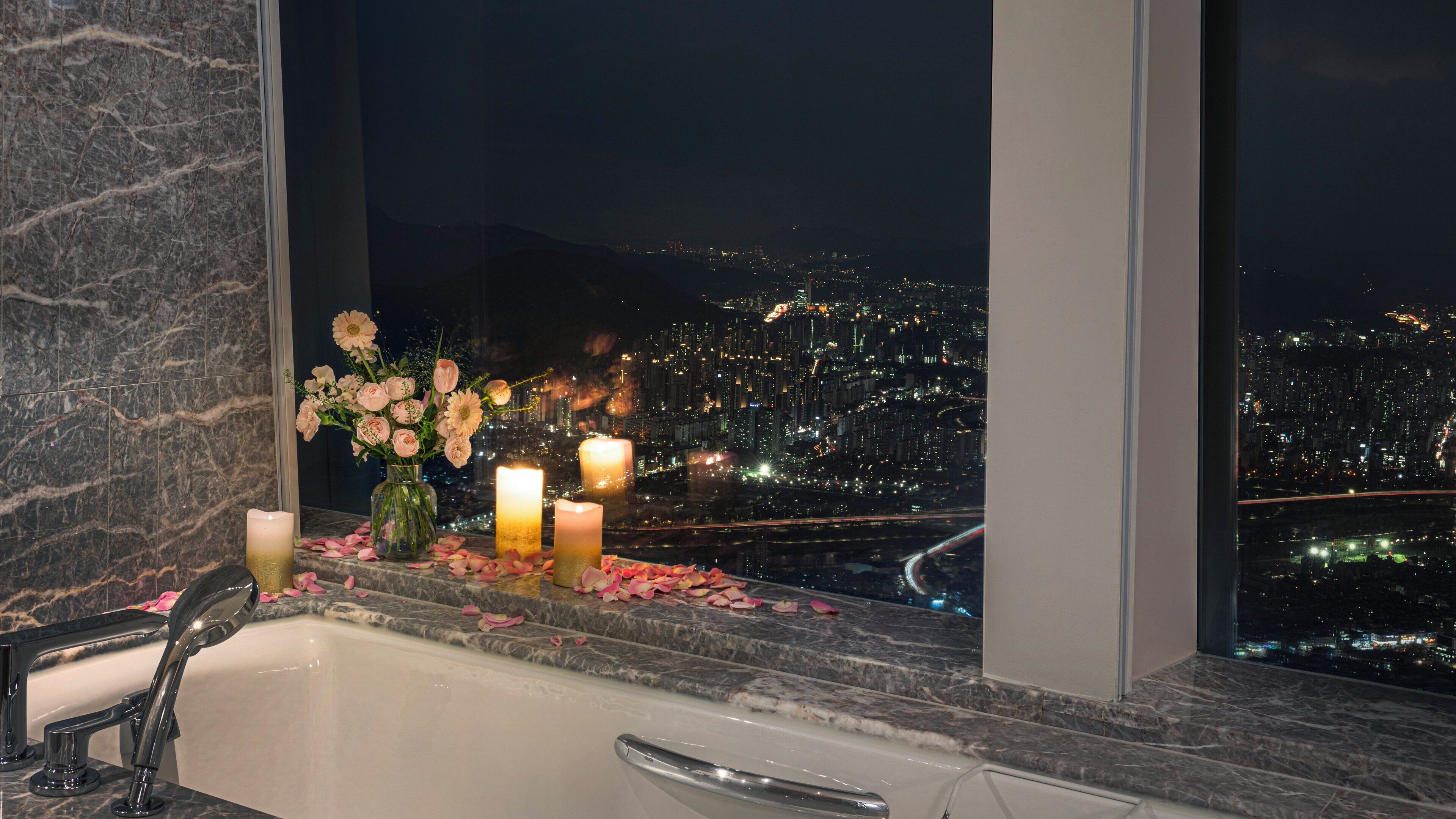 separate bathtub and shower, deep-soaking bathtub, designer toiletries