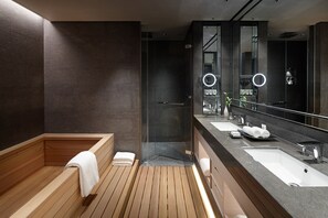Separate tub and shower, deep soaking tub, designer toiletries