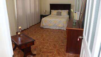 Junior Suite | Blackout drapes, rollaway beds, free WiFi, bed sheets