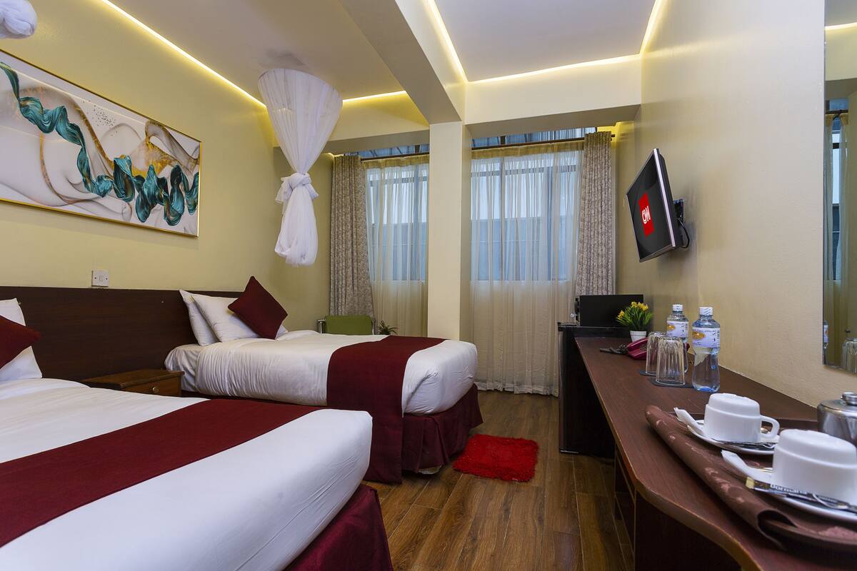 Deluxe kamer, 1 twee- of 2 eenpersoonsbedden | Luxe beddengoed, een kluis op de kamer, een bureau, een laptopwerkplek