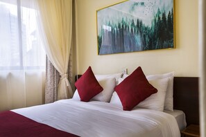 Phòng đơn Deluxe, 1 giường cỡ queen | Bộ đồ giường cao cấp, két bảo mật tại phòng, bàn 