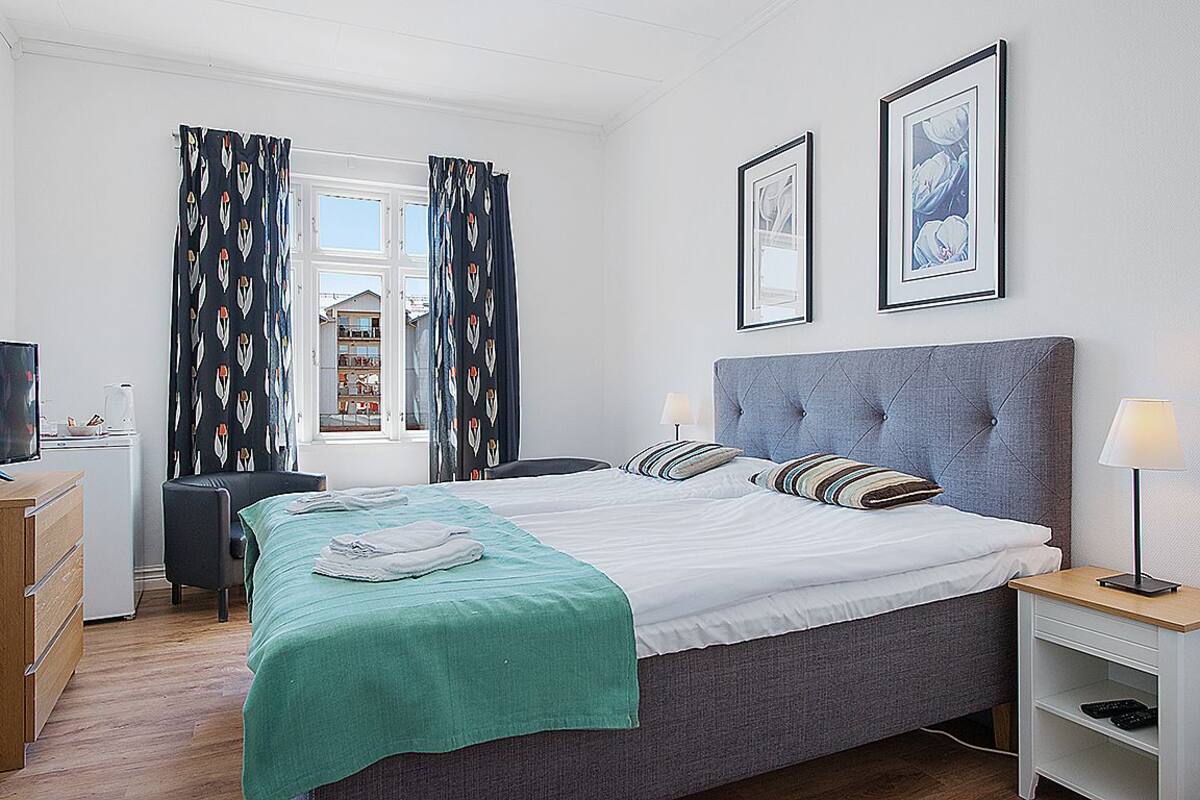 Basic Quadruple Room, Multiple Beds, Courtyard View, Courtyard Area | Individually decorated, individually furnished, free WiFi, bed sheets