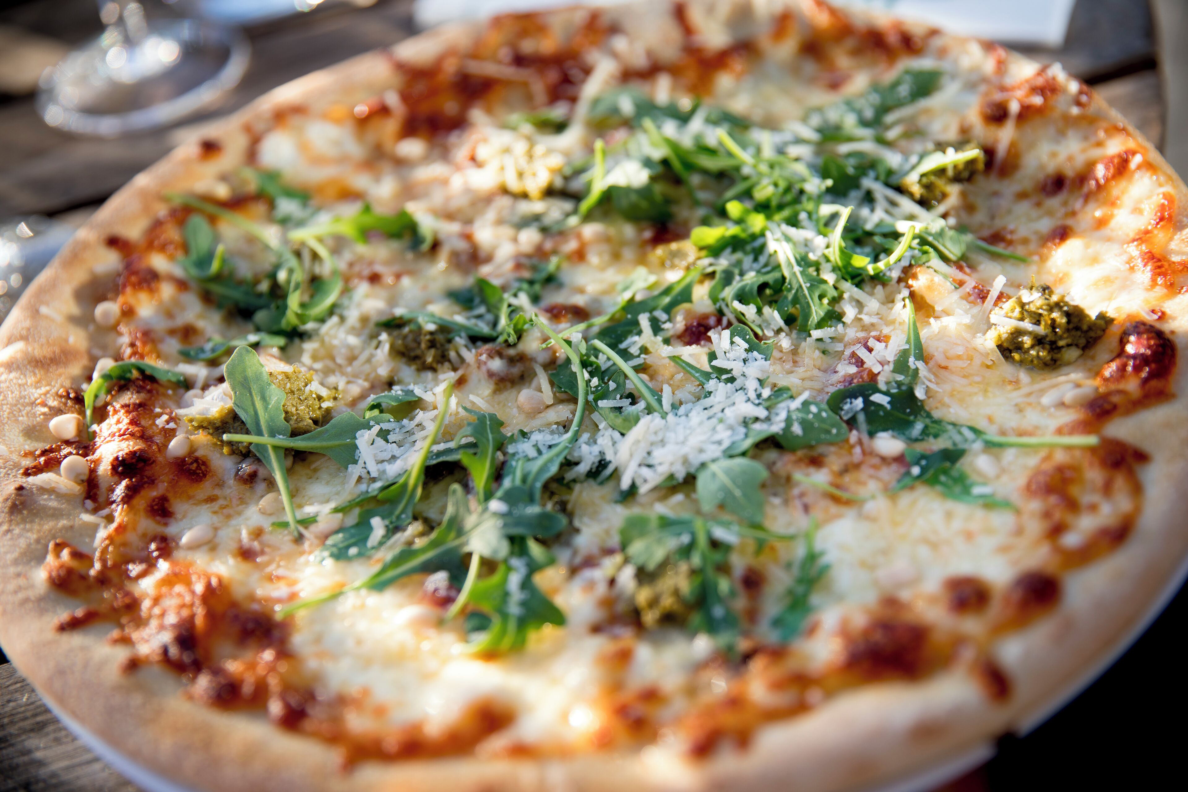 A pizza with various toppings.